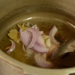 sliced onions sauted in ambur biryani preparation