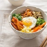 vegetarian Korean bibimbap with chop sticks on side