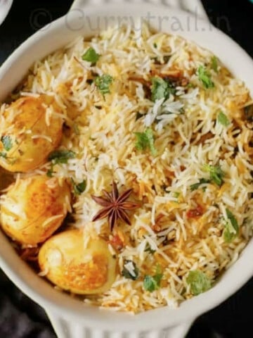 Hyderabadi dum biryani with eggs in bowl