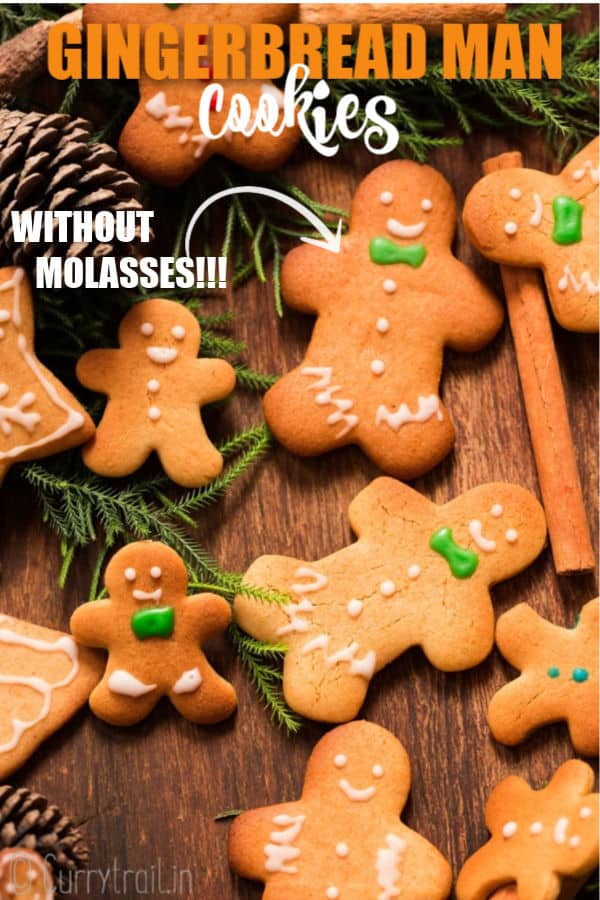 different sized gingerbread man cookies on wooden tray with text