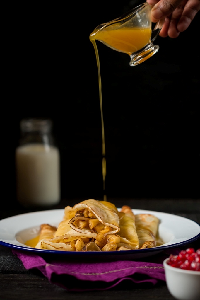 Crepes Filled With Apples & Topped With Orange Sauce