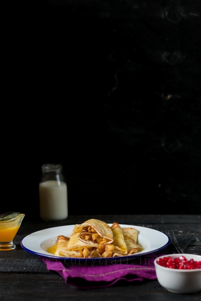 Crepes Filled With Apples & Topped With Orange Sauce