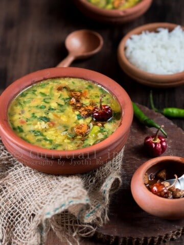 dal palak served in earthen pots is simple dal recipe with goodness of spinach