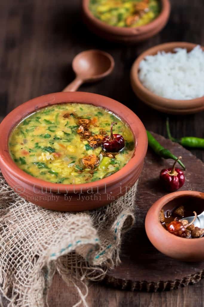 dal palak served in earthen pots is simple dal recipe with goodness of spinach