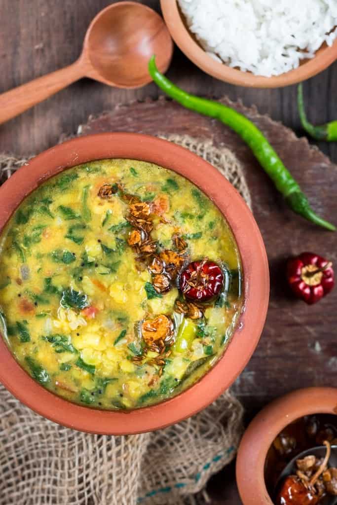 dal palak served in earthen pots is simple dal recipe with goodness of spinach