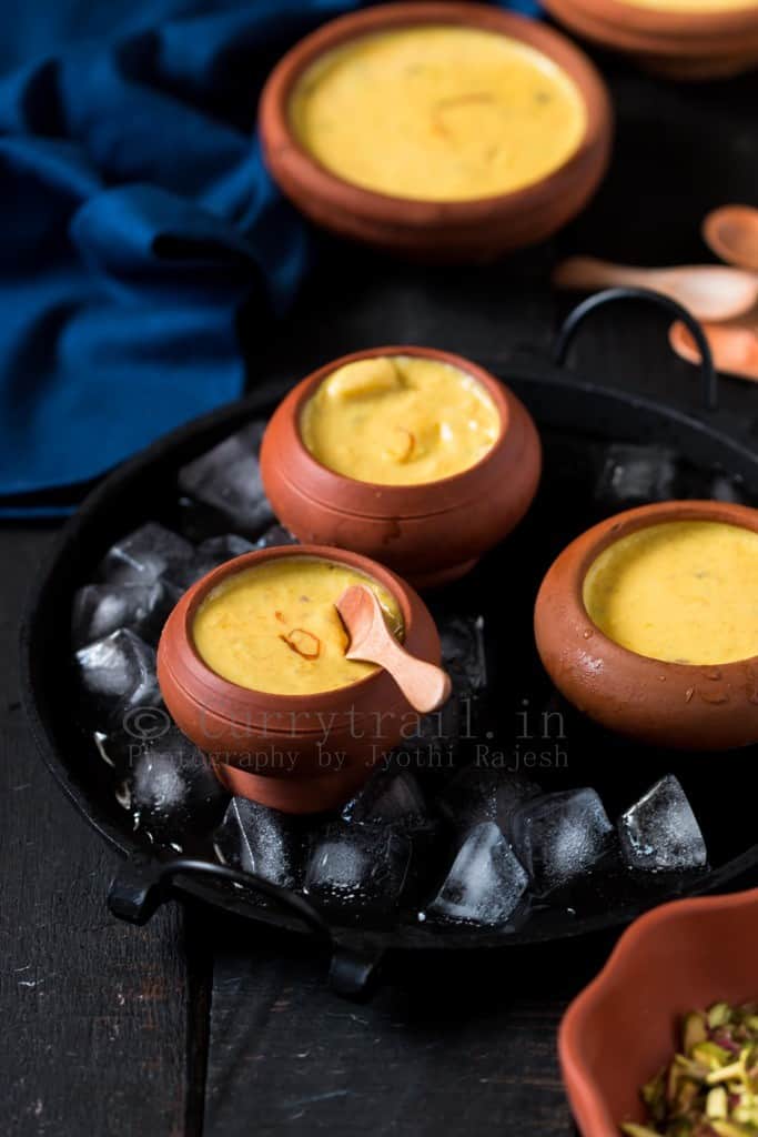 rich Indian mango ice cream served in earthen pots