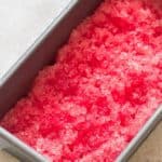 fresh watermelon granita in a tray.