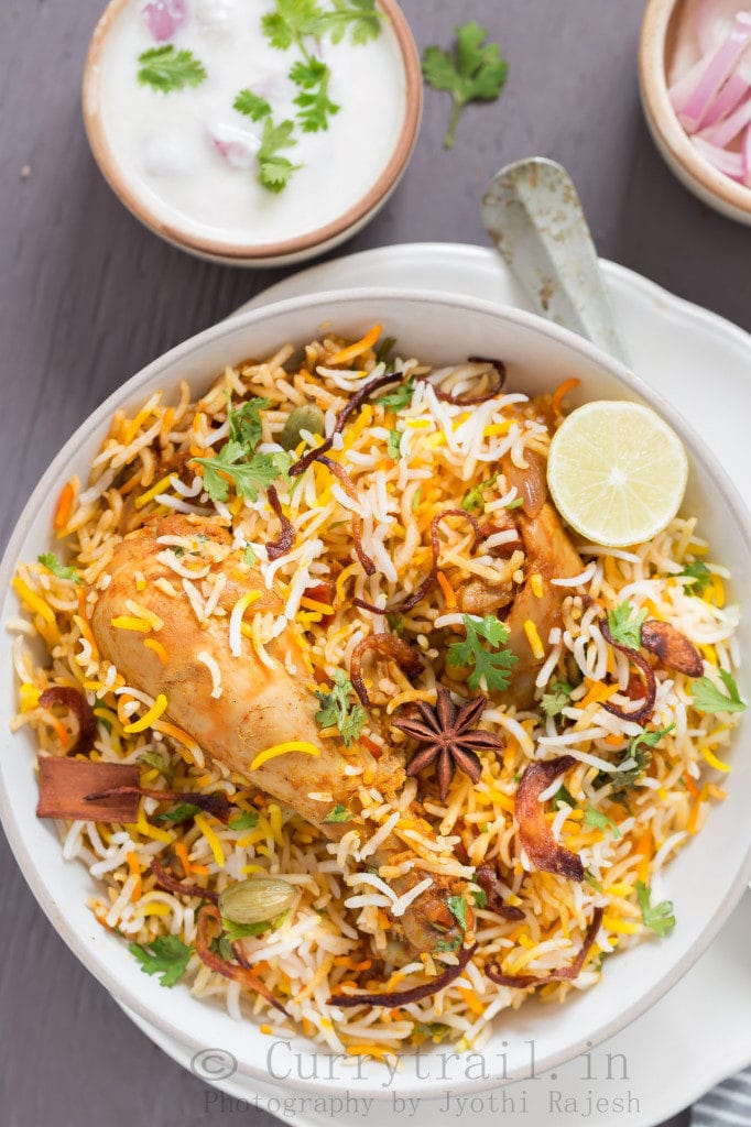 chicken dum biryani in ceramic bowl