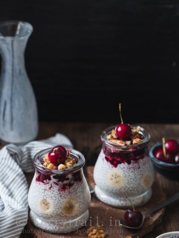 creamy chia breakfast pudding topping with cherry compost and walnuts