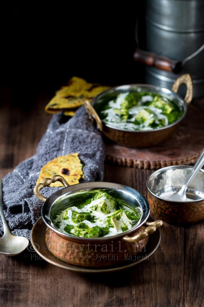 Vegan saag paneer served In 2 cooper serving bowls