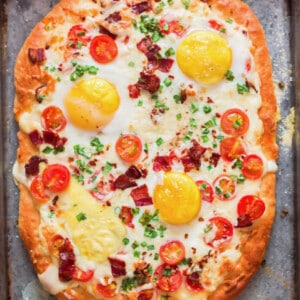 breakfast pizza with eggs and bacon