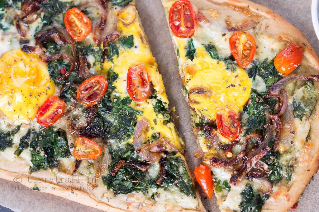 breakfast pizza with spinach and eggs