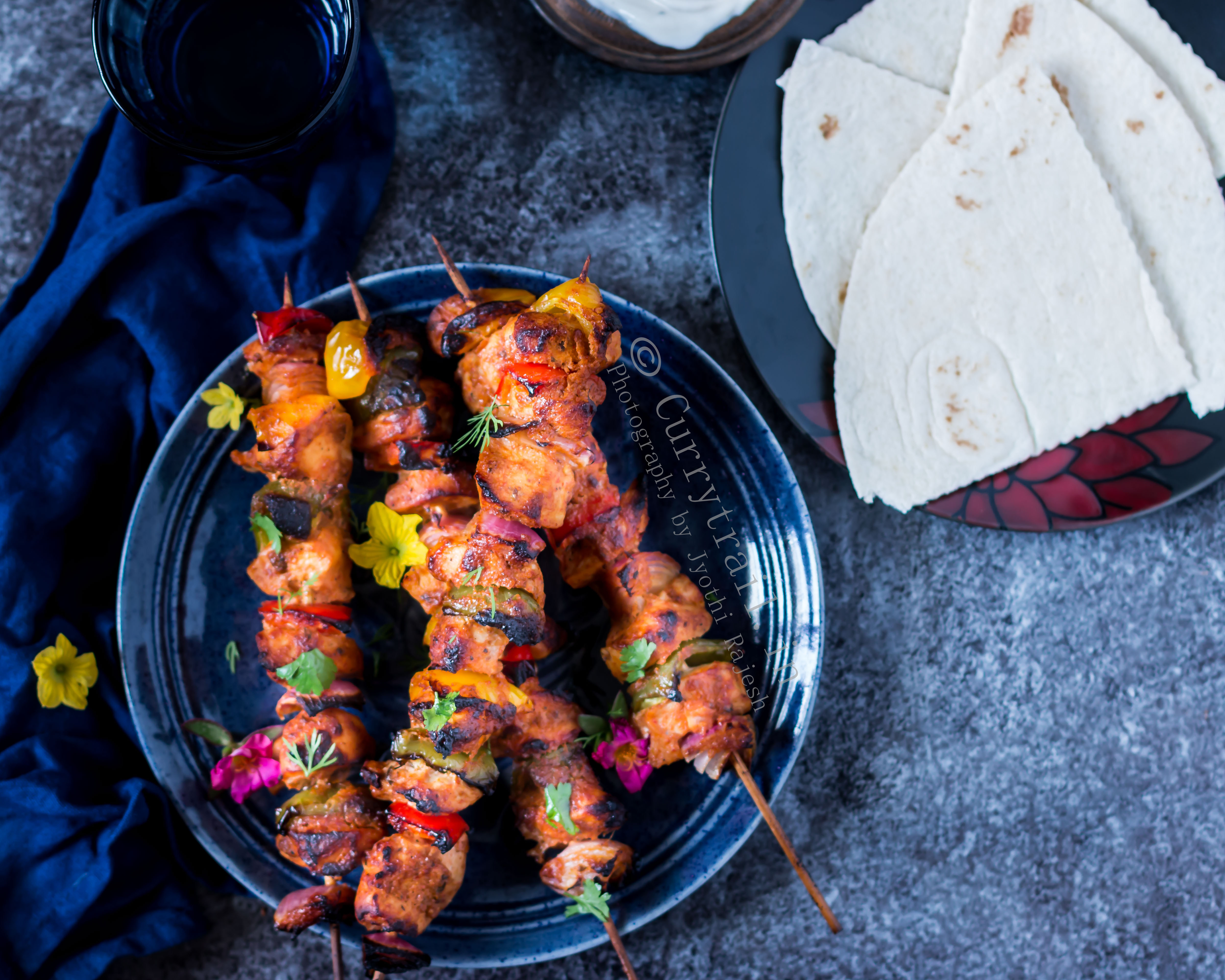 chicken shish kebab with vegetables on the skewers