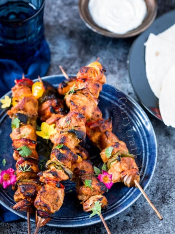 shish kebab skewers served with pita