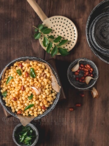 addictive kara boondi with curry leaves and peanuts on sides