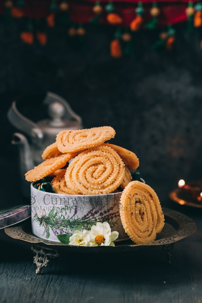 super crunchy butter murukku served in tin boxes