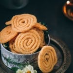 super crunchy butter murukku served in tin boxes