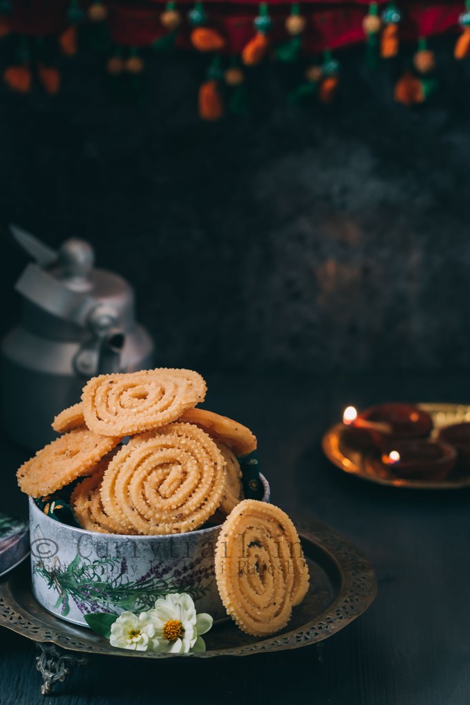 super crunchy butter murukku served in tin boxes