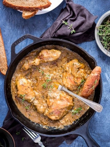cast iron skillet French onion chicken recipe with crusty bread