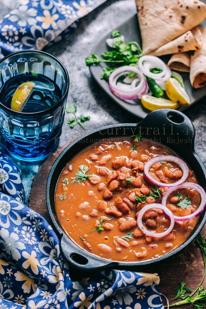 rajma masala is rich, creamy, spicy red bean curry served in cast iron pan