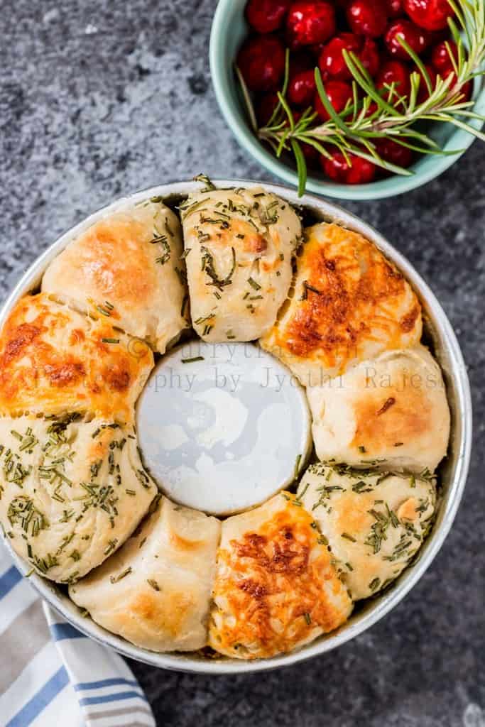 cheese herbs savory pull apart bread on baking dish