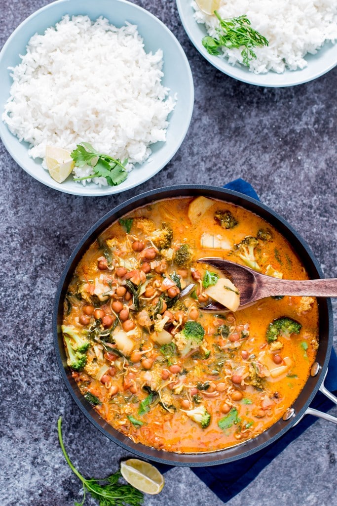 Pan with chickpea potato curry and spatula