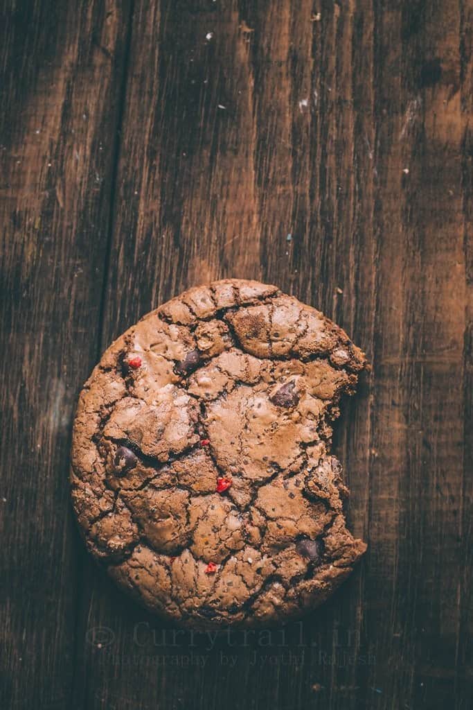 close up view of dark chocolate chili cookies on rustic background