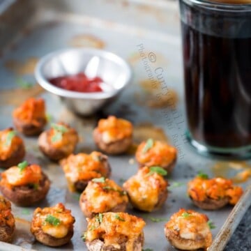 sausage stuffed mushrooms served in baking tray