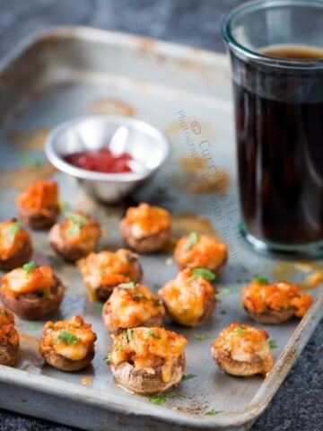 sausage stuffed mushrooms served in baking tray