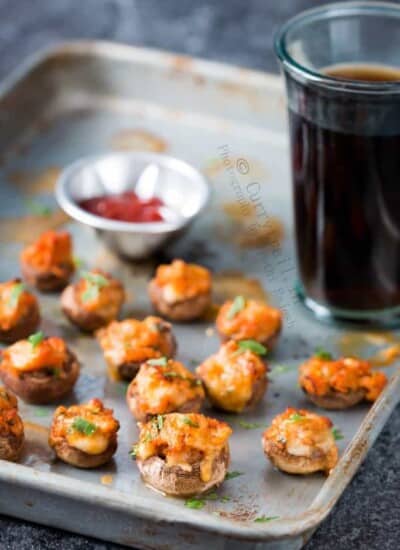 sausage stuffed mushrooms served in baking tray