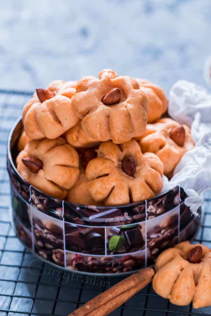 fall cookies shaped like pumpkin in candy box