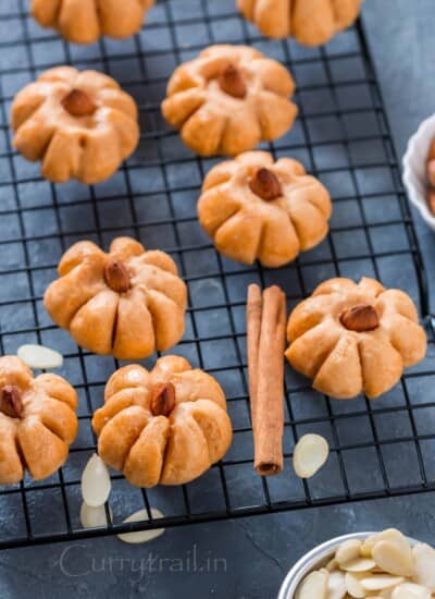 shaped like pumpkin - pumpkin cookies on wire mesh