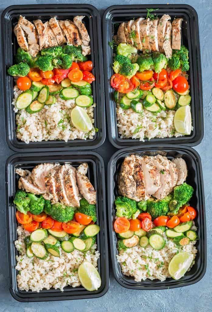 chicken meal prep with brown rice in four meal prep boxes