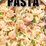 garlic shrimp pasta in cream sauce with text