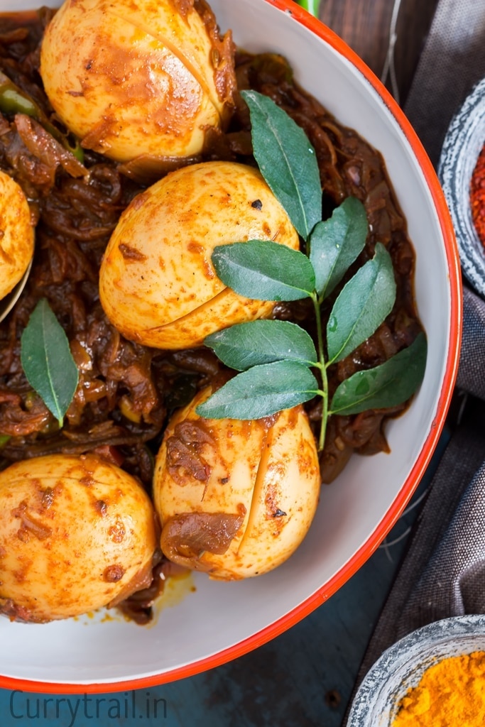 Kerala Style Egg Roast with curry leaf close up