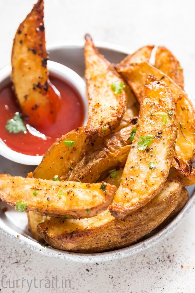 close up of Crispy Garlic Parmesan Baked Potato Wedges