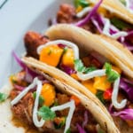 This easy tilapia fish tacos recipe with mango salsa is easy to make and the flavors in it is guaranteed to blow your mind. Are you ready for taco Tuesday? 30 minutes or less on the clock and you have the most delicious homemade tacos dinner to be served for dinner