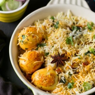 3 eggs in egg dum biryani in a casserole