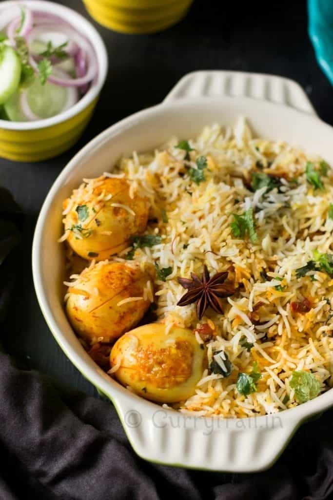 3 eggs in egg dum biryani in a casserole