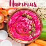 creamy beet hummus with crackers and veggies with text