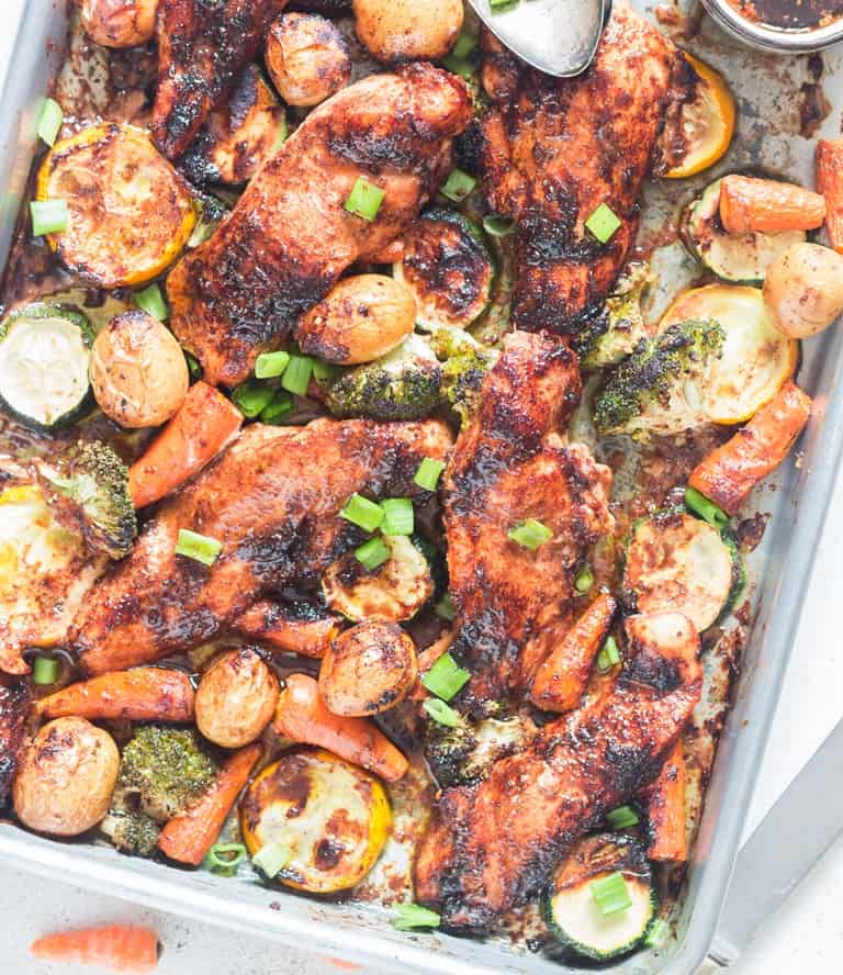 Teriyaki sheet pan chicken and vegetables drizzled with homemade teriyaki sauce