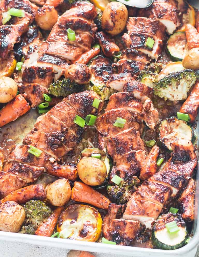 on a baking sheet teriyaki sheet pan chicken with homemade teriyaki sauce made using chicken breasts and sliced