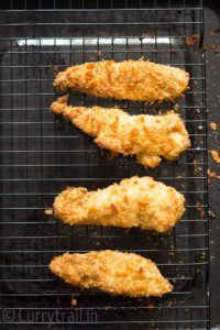 Fresh out of oven crispy baked chicken tenders with Parmesan and Panko crust