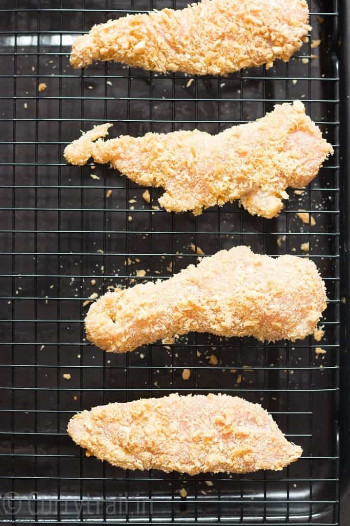 Ready to go into oven for crispy baked chicken tenders with Parmesan and Panko crust