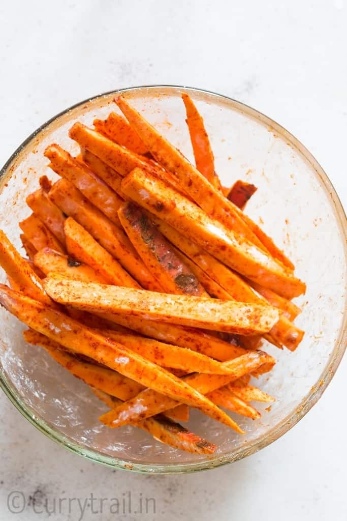 potato fingers in glass bowl for baked sweet potato fries