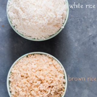 white rice and brown rice served in small green bowls