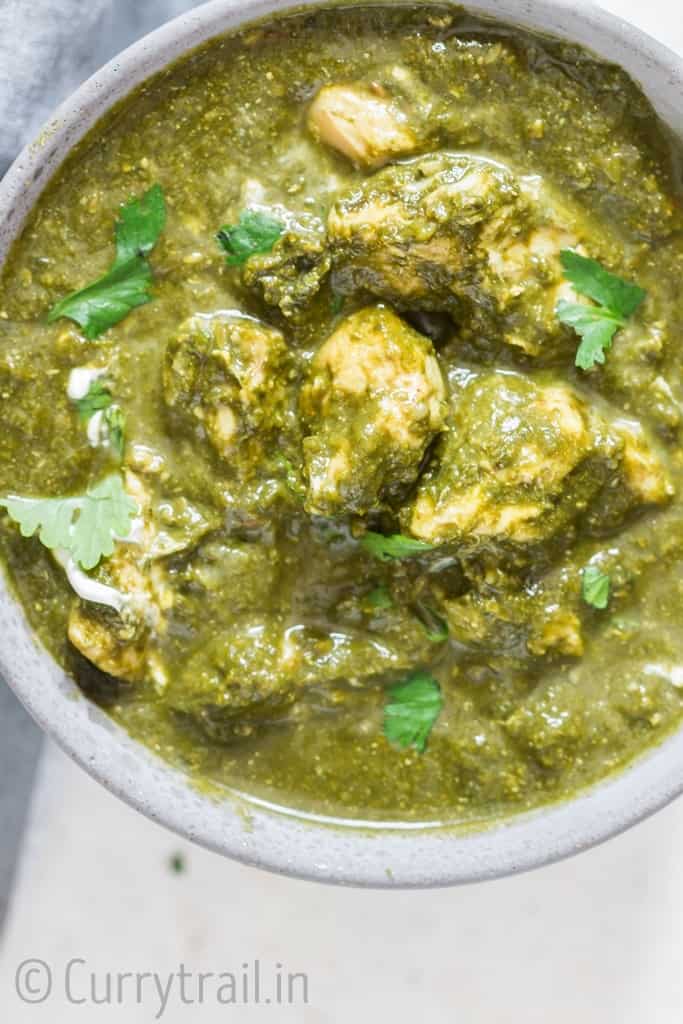 instant pot saag chicken with rice in a bowl