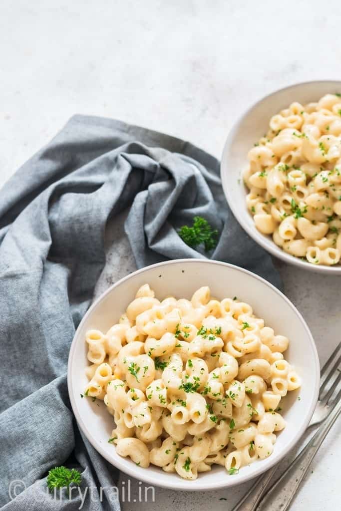instant pot mac and cheese served in two white bowls