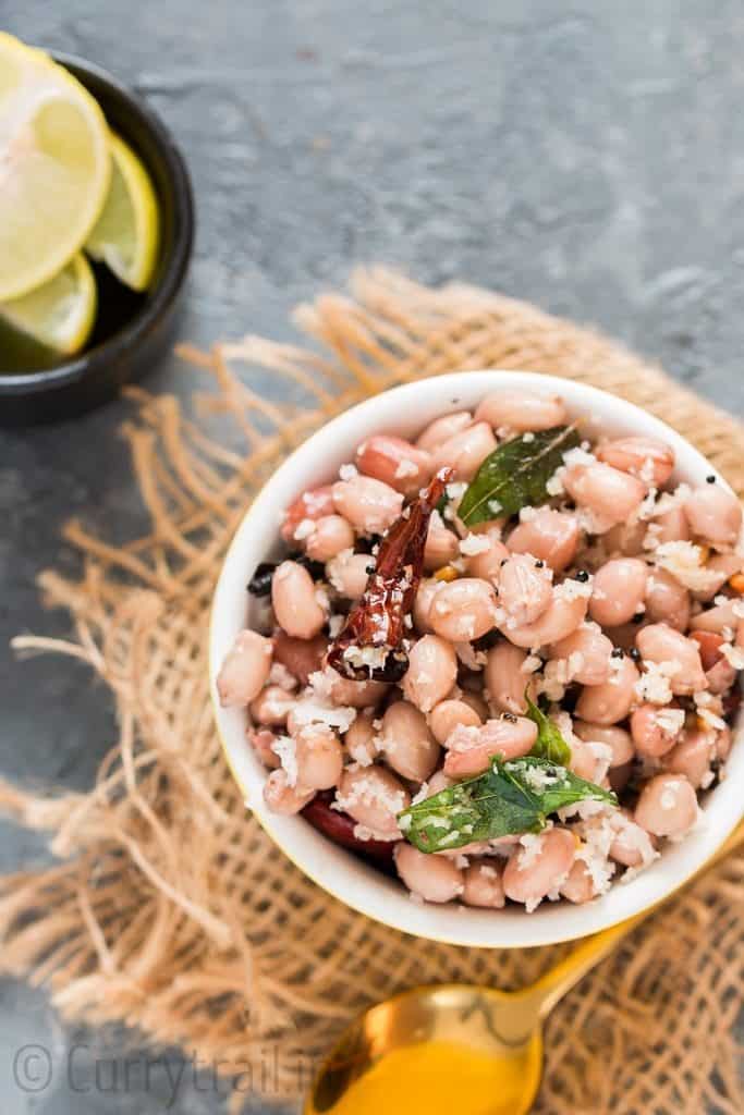 boiled South Indian peanut salad with dried red chilies and curry leaves