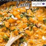 Thai butternut squash curry cooked in skillet with text